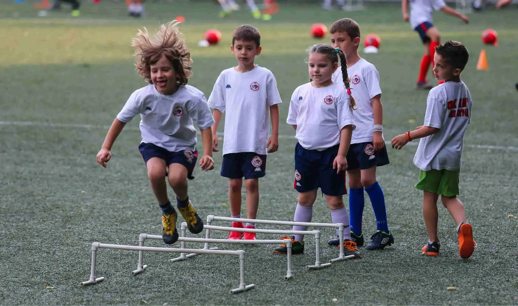Children training at the FK IMT football school